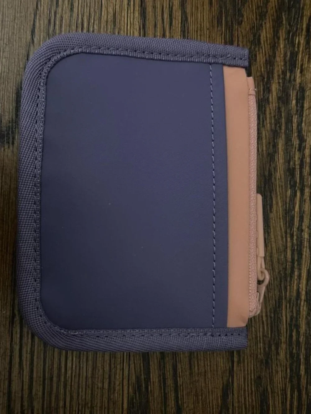 Lululemon purple, lavender, and peach zip up water-resistant cardholder
